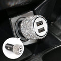 Diamond car charger with dual USB ports and safety hammer, shown in black with sleek design and LED indicator lights.