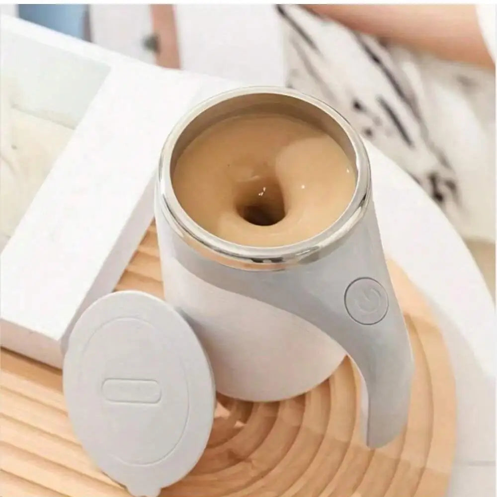 Stainless steel Showlu Automatic Magnetic Stirring Coffee Mug with mixer, designed for efficient coffee mixing and modern style.