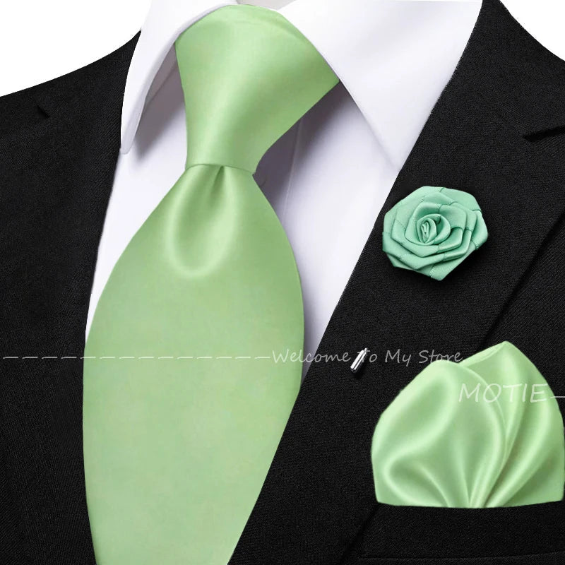 Men's sage green tie set with pocket square, flower brooch, cufflinks, and collar accessory for wedding or daily wear.