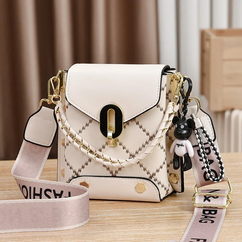 SimpleSling™ Crossbody Bag by Stone's Store, lightweight and stylish, shown in a neutral color with adjustable strap and compact design.