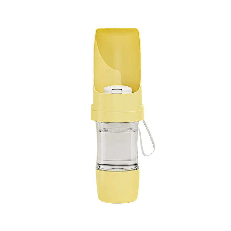 Showlu 2-in-1 portable pet water bottle and food container, 500ml capacity, with a compact design for travel and outdoor use.