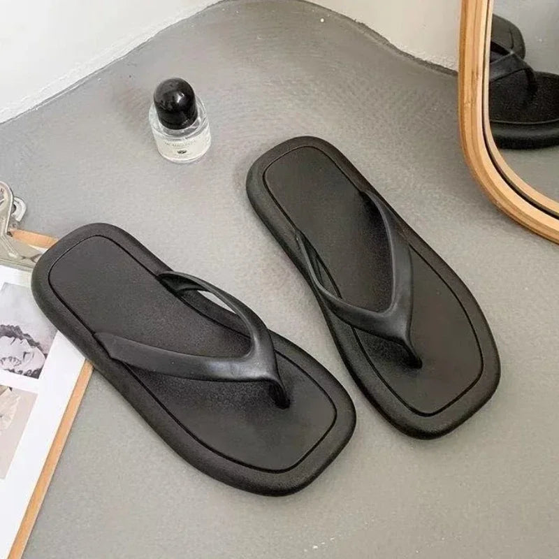 Women's summer flip flops by SHOWLU FASHION STORE, flat PVC slides with stylish design and comfortable footbed.