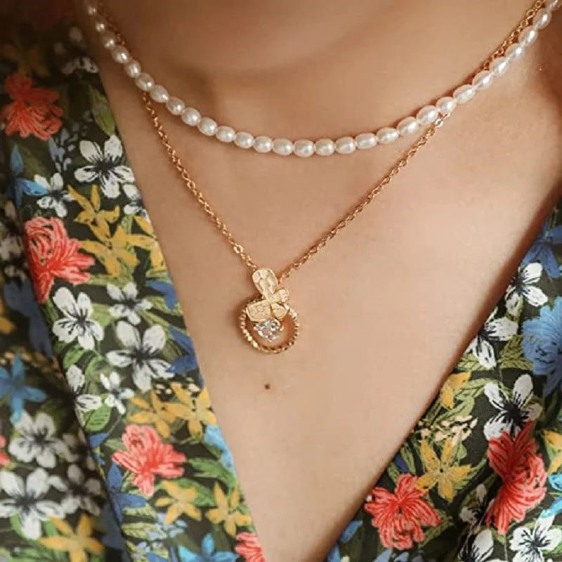 Hengsheng white freshwater pearl choker necklace with 5-7mm oval pearls, elegant jewelry piece, natural luster and smooth surface.