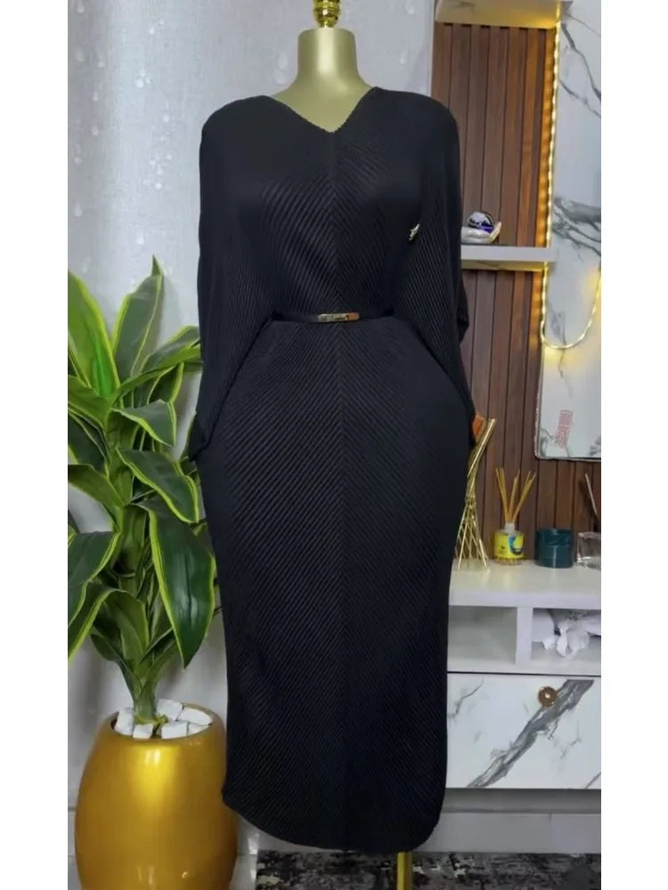 Miyake pleated V-neck dress with bat sleeves, lace-up front, slim waist, in a foreign style, spring 2025 women's fashion.