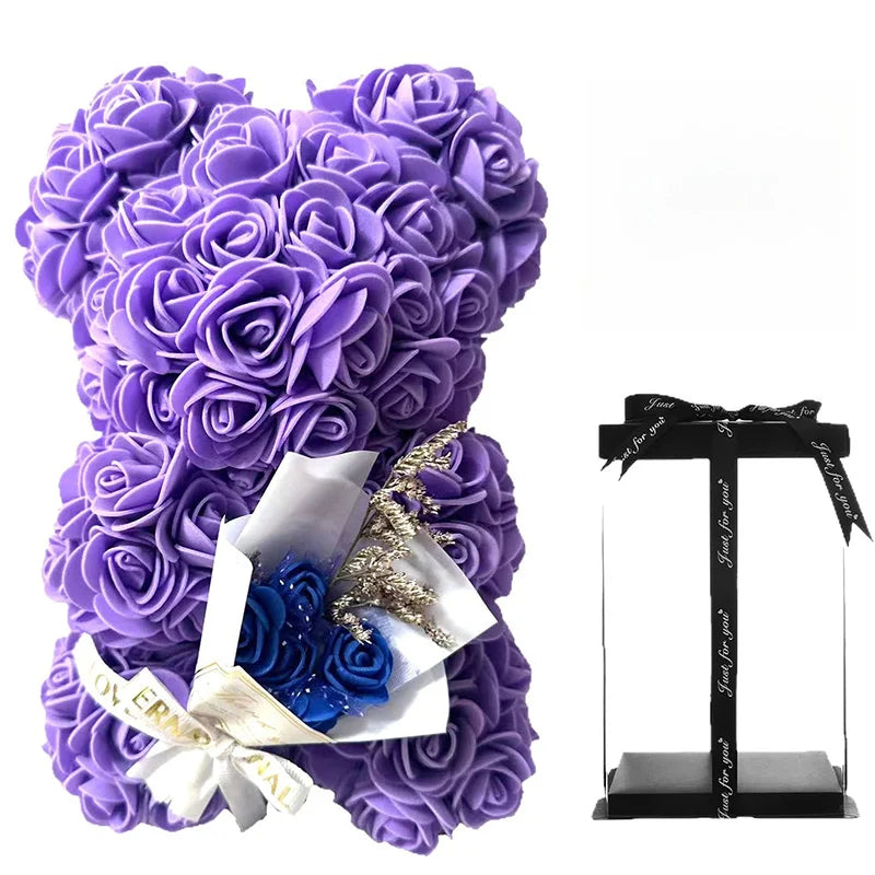 Artificial 25cm rose bear from Showlu Fashion with foam roses, perfect as a gift, displayed in a decorative box.