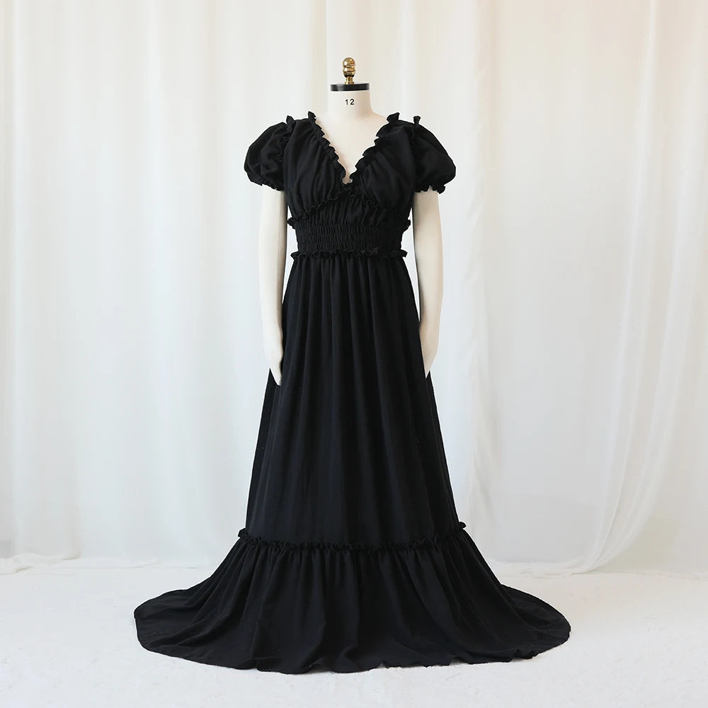 Showlu Bohemian maternity maxi gown with off-shoulder ruffled design, flowing fabric, perfect for maternity photoshoots
