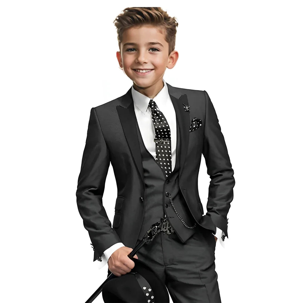 Navy blue boys tuxedo 3-piece suit with blazer, pants, and vest, suitable for weddings and formal occasions for ages 2-16.