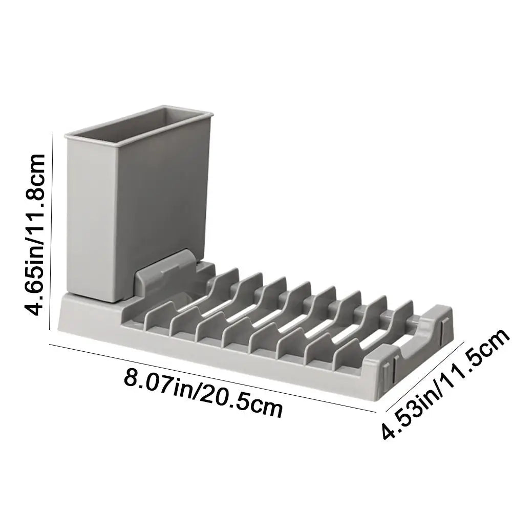 Foldable Showlu Smart General dish drying rack with multiple slots and a drip tray, designed for kitchen countertop use.