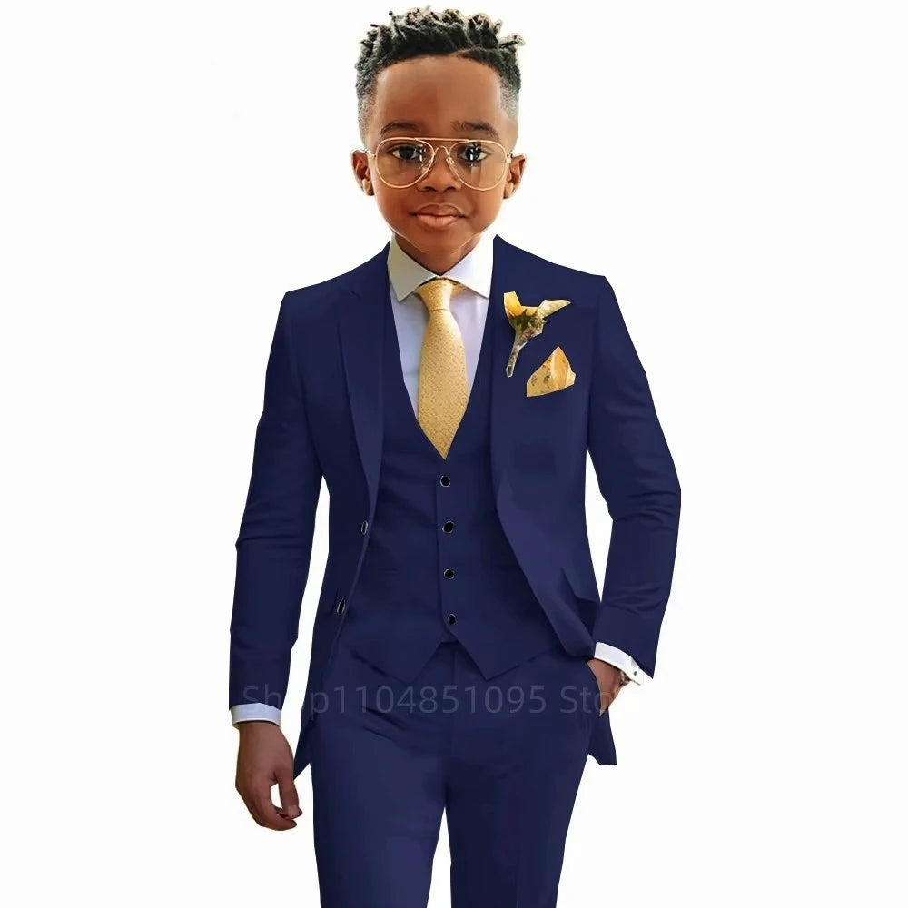 Boy's formal 3-piece suit set by 1170uf-he, featuring a blazer, vest, and trousers for weddings and parties.