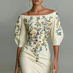A cream-colored off-the-shoulder sheath dress featuring a colorful floral print and lantern sleeves.