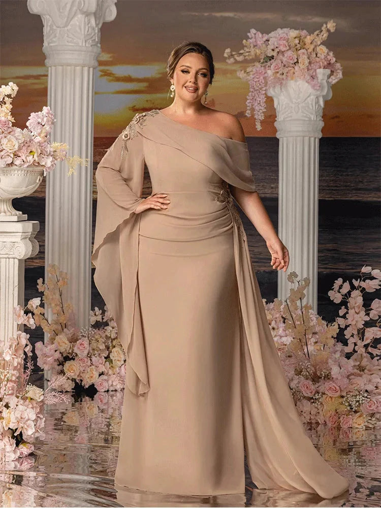 Apricot chiffon plus size strapless floor-length gown by Showlu Fashion, elegant design with flowing fabric and a fitted bodice.