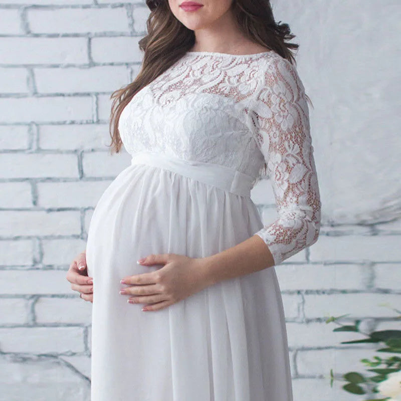 Lace maternity maxi gown with 3/4 sleeves, designed for photography, featuring a flowing silhouette and elegant detail.