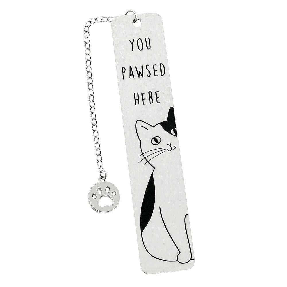 Colorful stainless steel waving cat bookmark with geometric design, perfect for marking pages in books.