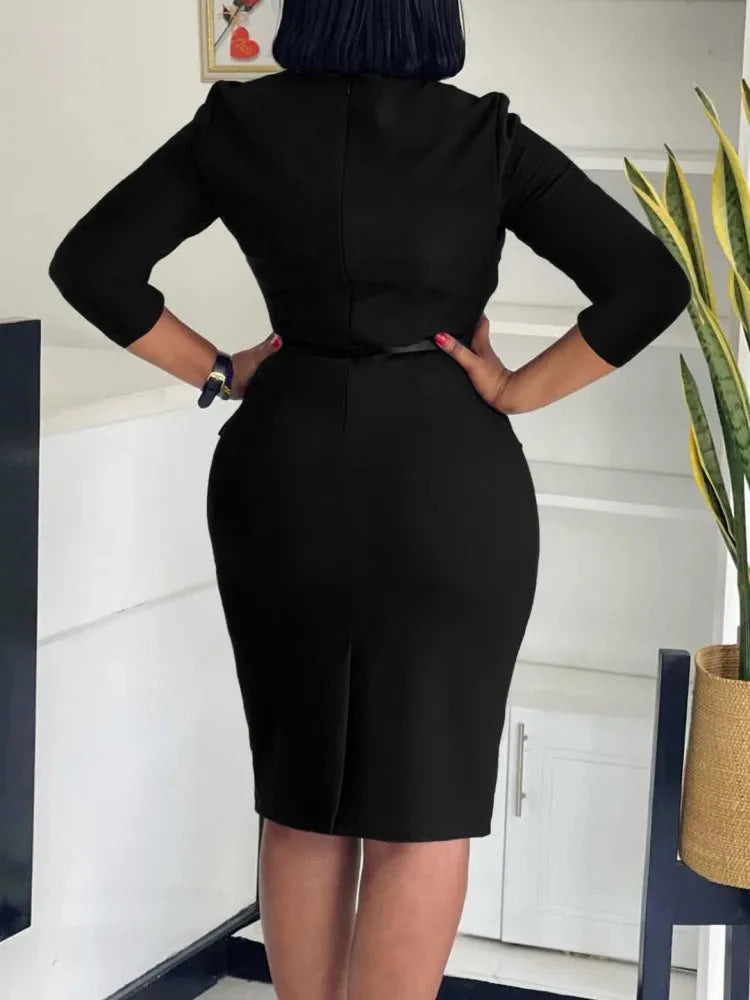 Plus size women's midi dress by SHOWLU FASHION STORE featuring elegant 3/4 sleeves and a fitted pencil silhouette.
