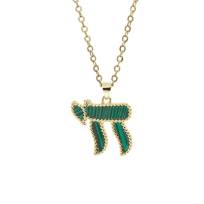 Hebrew Chai pendant necklace by Hayaroma in copper with zircon accents, Jewish jewelry featuring a traditional symbol.