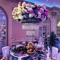 Tall gold crystal wedding centerpiece on a 4-layer metal stand, featuring elegant crystal accents for special event decor