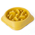 Pet dog slow feeder bowl by Showlu Fashion Store with non-slip puzzle design for medium and small dogs and puppies.