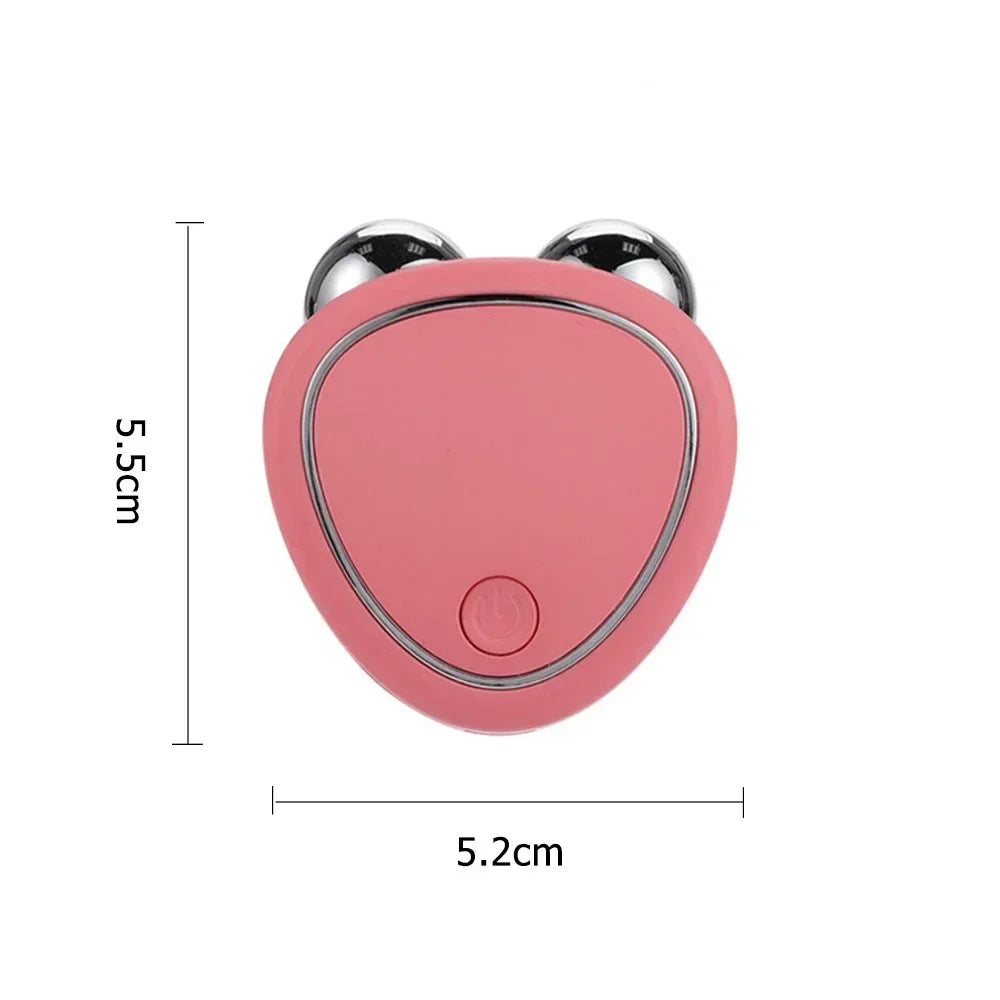 SHOWLU FASHION STORE KEMOKO EMS Microcurrent Facial Massager for face lifting and skin rejuvenation, showing the device in use.