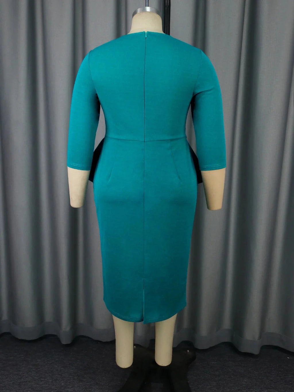 AOMEI Women's Peplum Church Dress with long sleeves, midi length African gown in elegant fabric, worn by a model.