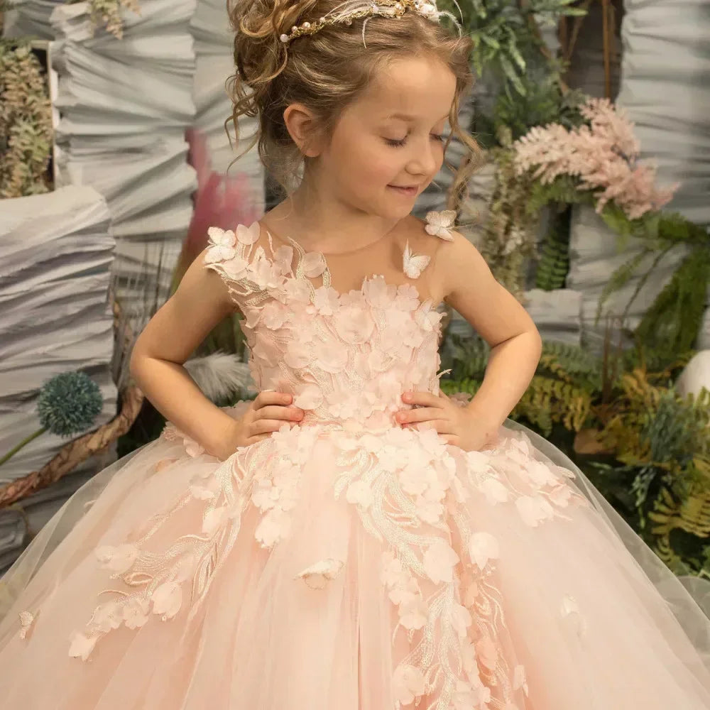 Pink 3D floral butterfly applique flower girl dress by Showlu Fashion Store with intricate floral and butterfly details.