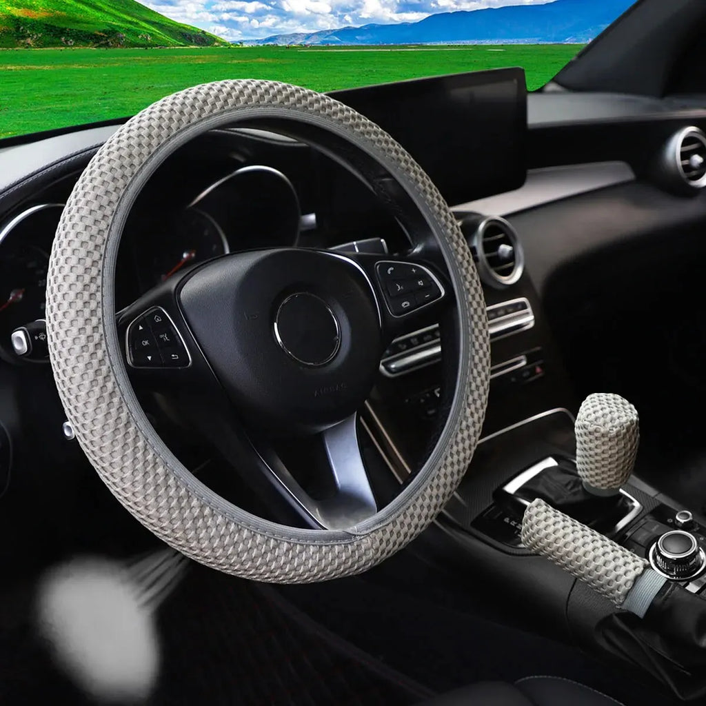 Breathable 3-piece massage mesh cloth car steering wheel cover and handle cover for 14.5-15 inch vehicles, shows textured fabric and fit.