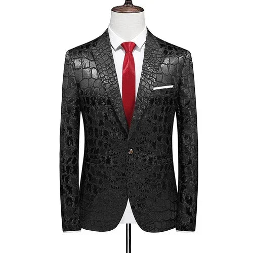 A black men's suit jacket with a textured crocodile-skin pattern and a red necktie.