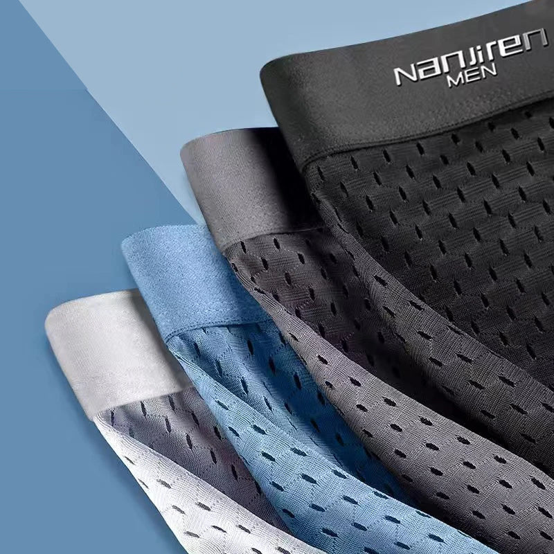 Showlu men's ice silk boxer shorts with breathable mesh polyester fabric, designed for comfortable, lightweight underwear.