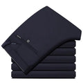 Men's stretch travel dress pants from Showlu Fashion, lightweight slim fit business trousers with no iron needed for office wear.