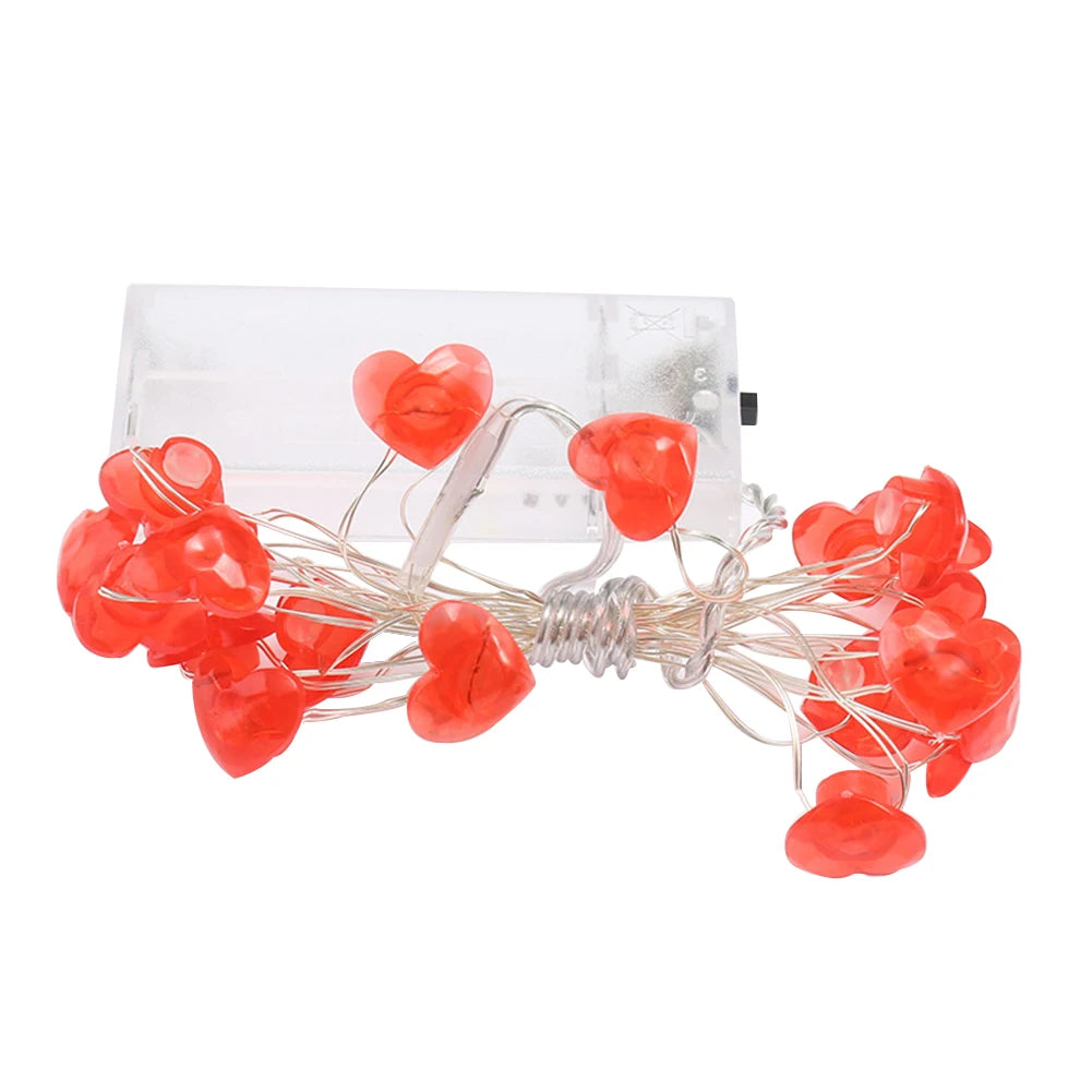 Red heart-shaped string lights with 20/30 LEDs, perfect for Valentine's Day, Christmas, or romantic decorations.
