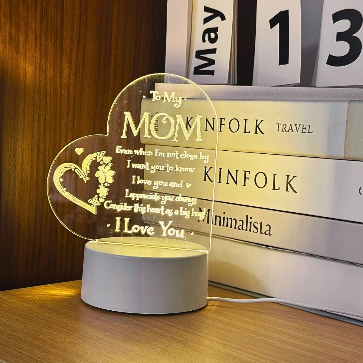 Showlu Fashion Heart Carving Night Light glowing softly, ideal for gifting to moms on birthdays, with a warm, decorative design.