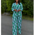 African stripe print two-piece set from SHOWLU FASHION with long sleeve shirt and wide-leg pants, featuring bold geometric patterns.