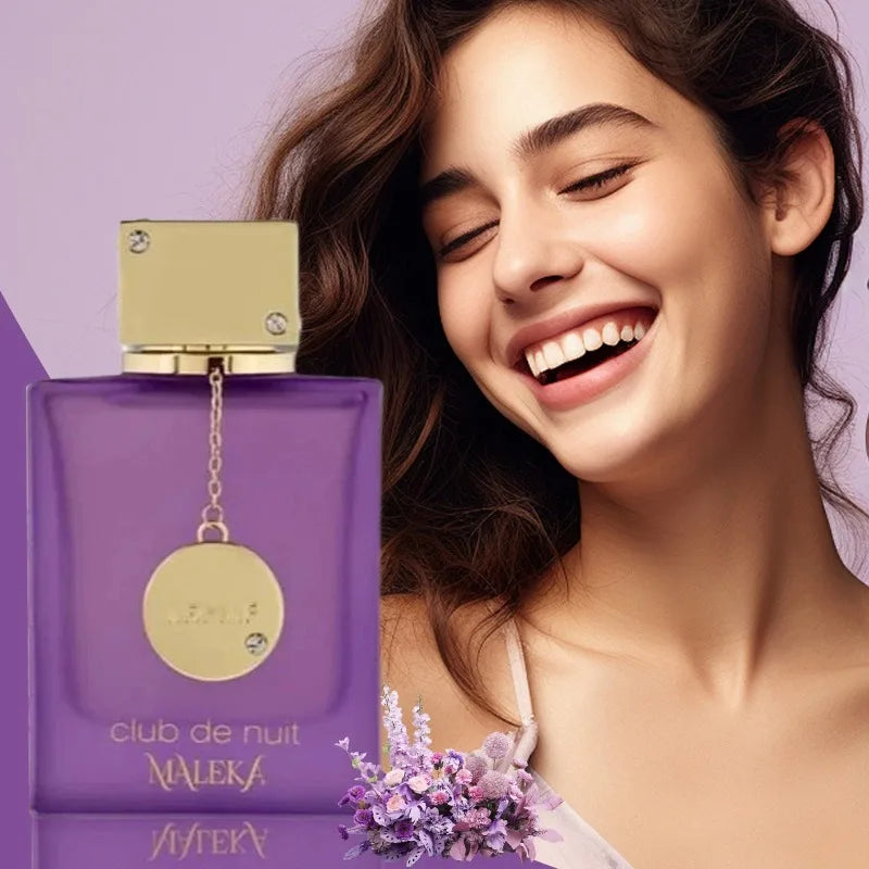 Unisex Armaf Club De Nuit Maleka Pheromone Perfume in 100ml bottle, featuring a gourmand scent, displayed with a decorative background.