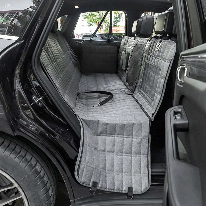 Waterproof Showlu Dog Car Seat Cover in plaid nylon, designed as a pet travel hammock for secure car journeys.