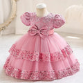 Girls lace bow party dress by Showlu Fashion Store, short sleeve summer ball gown with delicate lace and bow detail.
