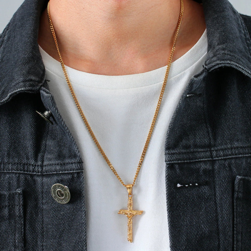 Gold-colored stainless steel Catholic cross necklace with Jesus pendant, religious jewelry for men and women, suitable for prayer and faith.