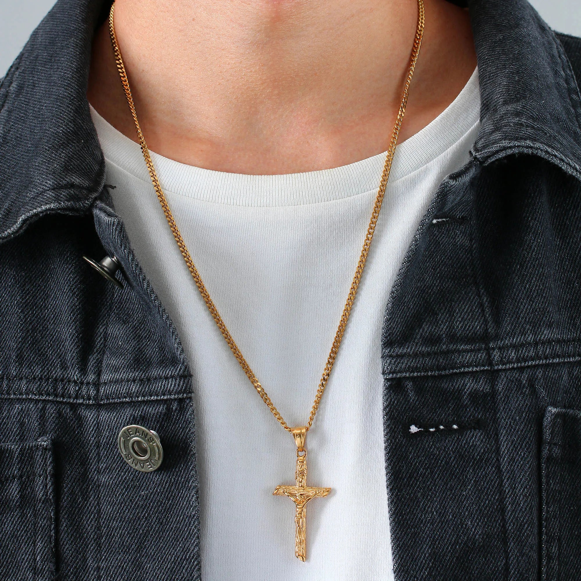 Gold-colored stainless steel Catholic cross necklace with Jesus pendant, religious jewelry for men and women, suitable for prayer and faith.