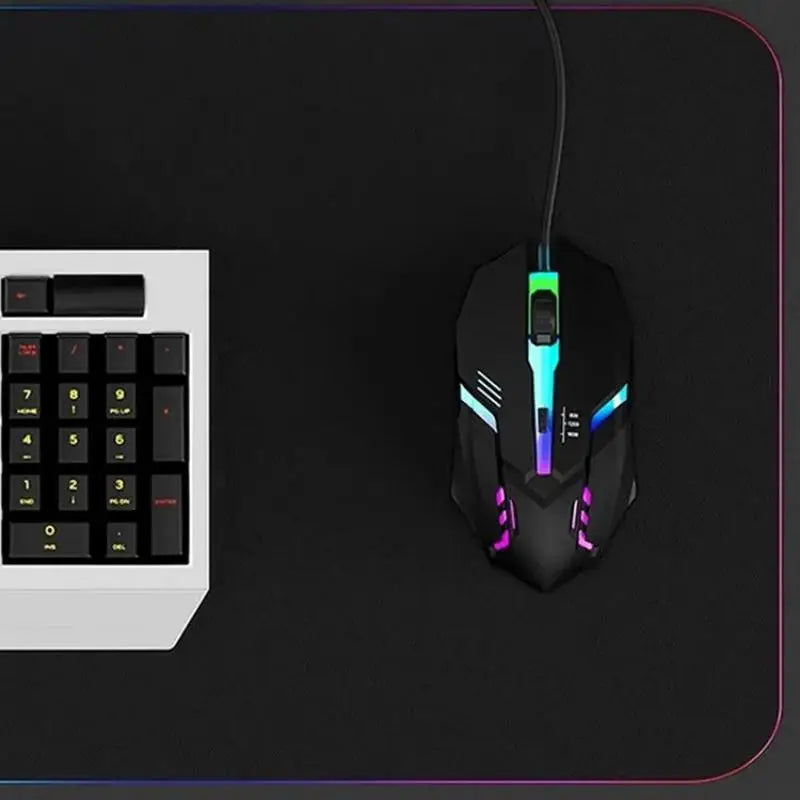 High-quality ergonomic gaming mouse with backlit buttons, designed for desktops and laptops, featuring a sleek USB connection.