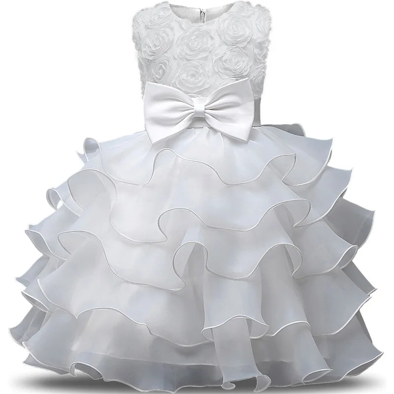 Little girl in a white flower girl dress for wedding, birthday, or communion, by Showlu Fashion Store, ages 2-8 years.