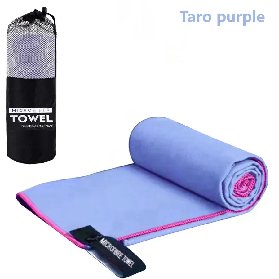 SHOWLU Quick-Dry Microfiber Sports Towel for gym, yoga, and camping, shown folded with textured microfiber fabric detail