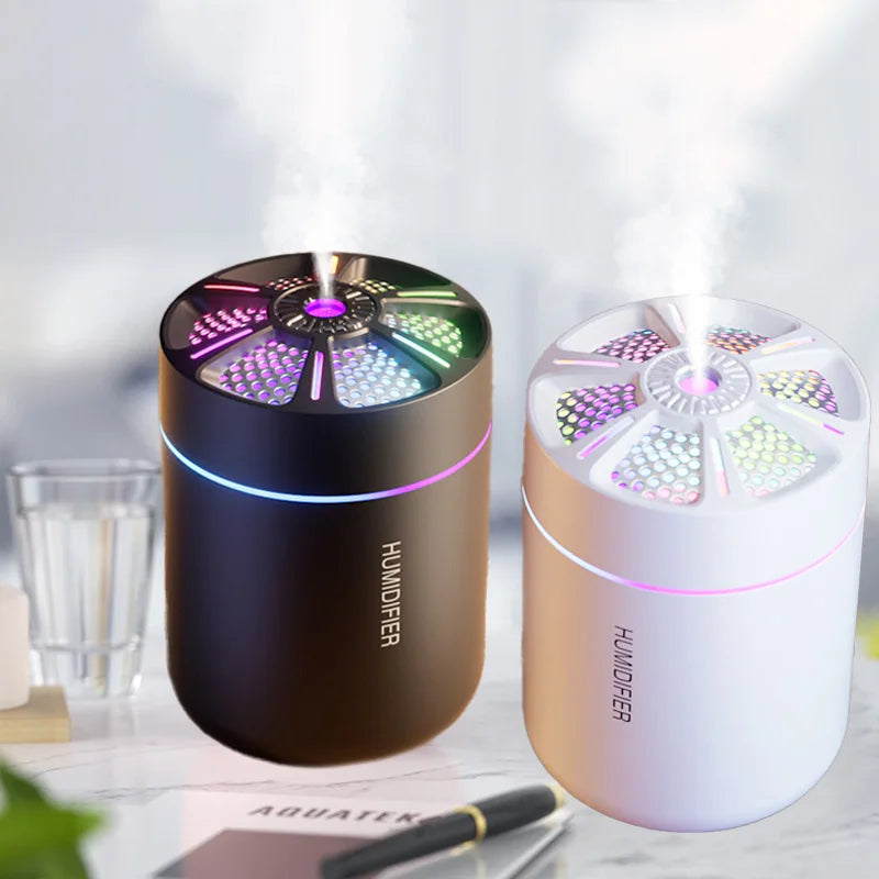 Showlu Smart General Mini USB Humidifier in white, compact design with mist outlet and control dial on top.