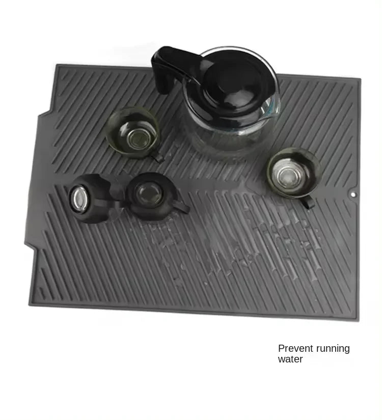 Showlu Smart General silicone sink protector mat with drainage holes, designed to prevent scratches and catch debris in the kitchen sink.
