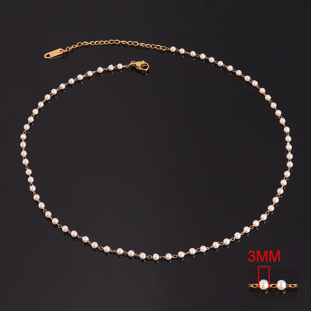 Stainless steel pearl necklace for women featuring a white imitation pearl choker and delicate clavicle chain, elegant jewelry accessory.
