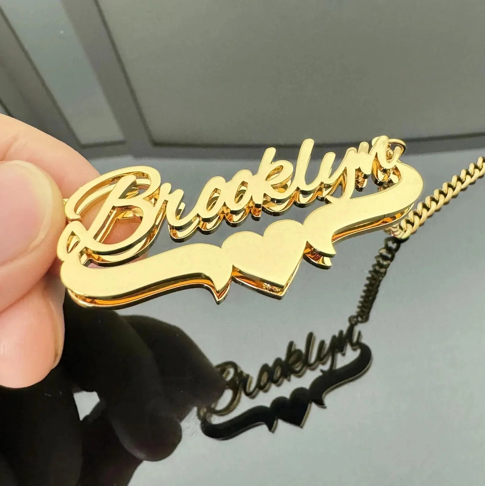 Double name plate necklace by Showlu Fashion featuring 3D stainless steel jewelry with customized engraved names.
