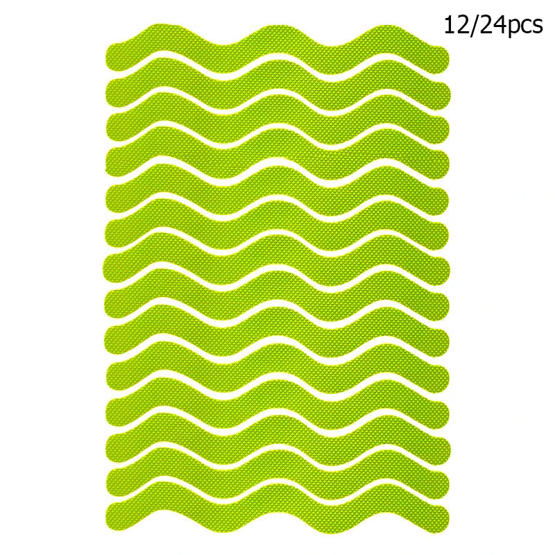 Showlu Smart General anti-slip shower stickers on a bathroom floor for safety, featuring textured grip surfaces.