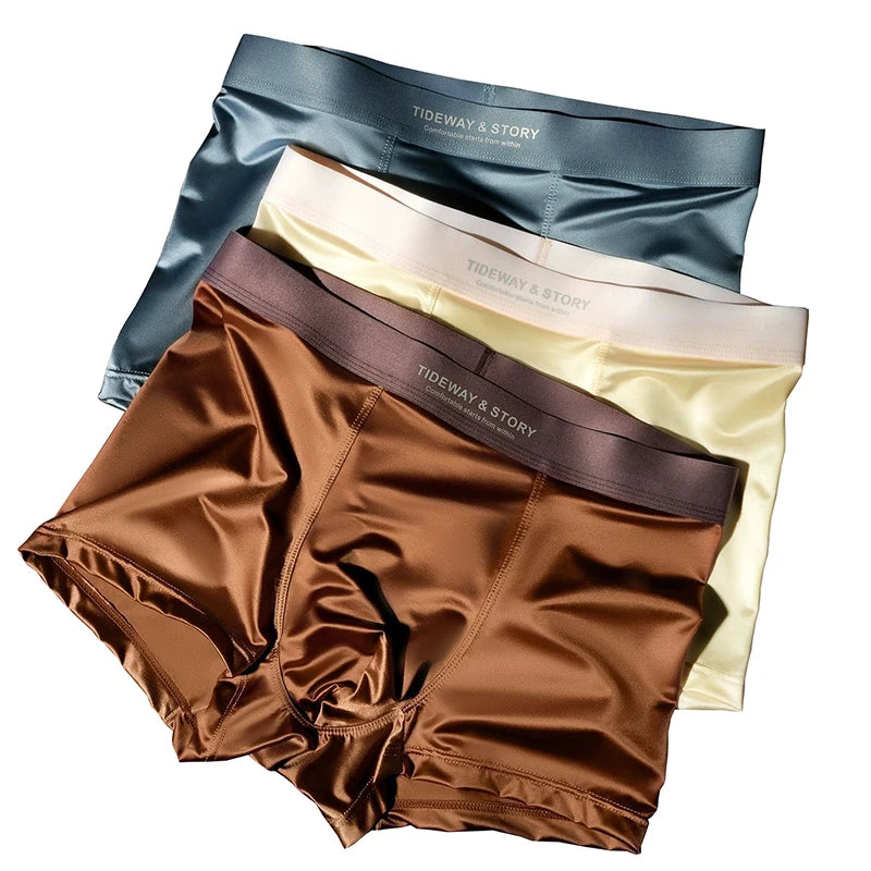 Four pairs of Showlu Men's Ice Silk Boxer Shorts in breathable, seamless design, displayed in a 4-pack.