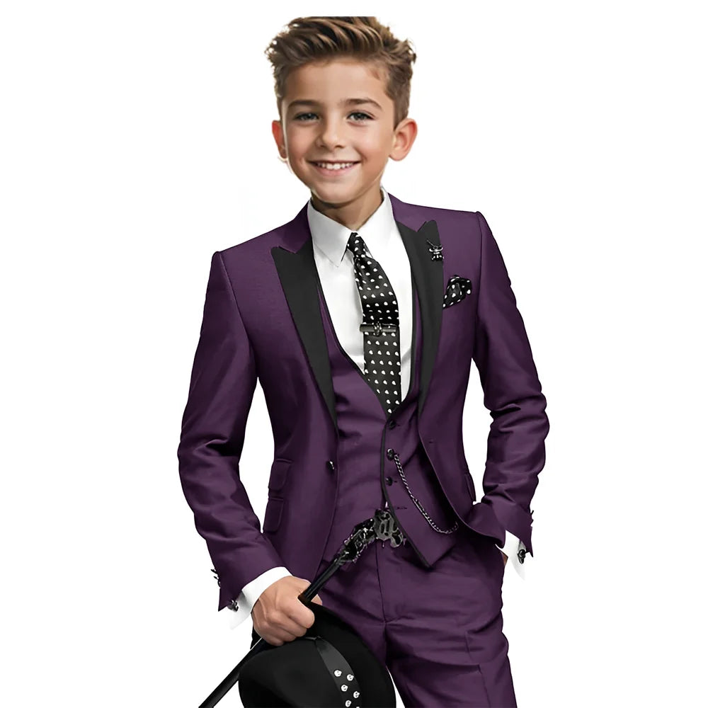 Navy blue boys tuxedo set with blazer, pants, and vest for ages 2-16, formal wedding boy suit by Showlu Fashion Store.