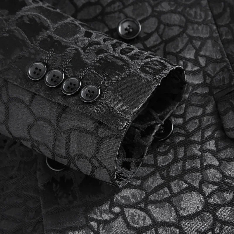 A black double-breasted suit jacket featuring a textured, patterned fabric and buttoned cuffs.