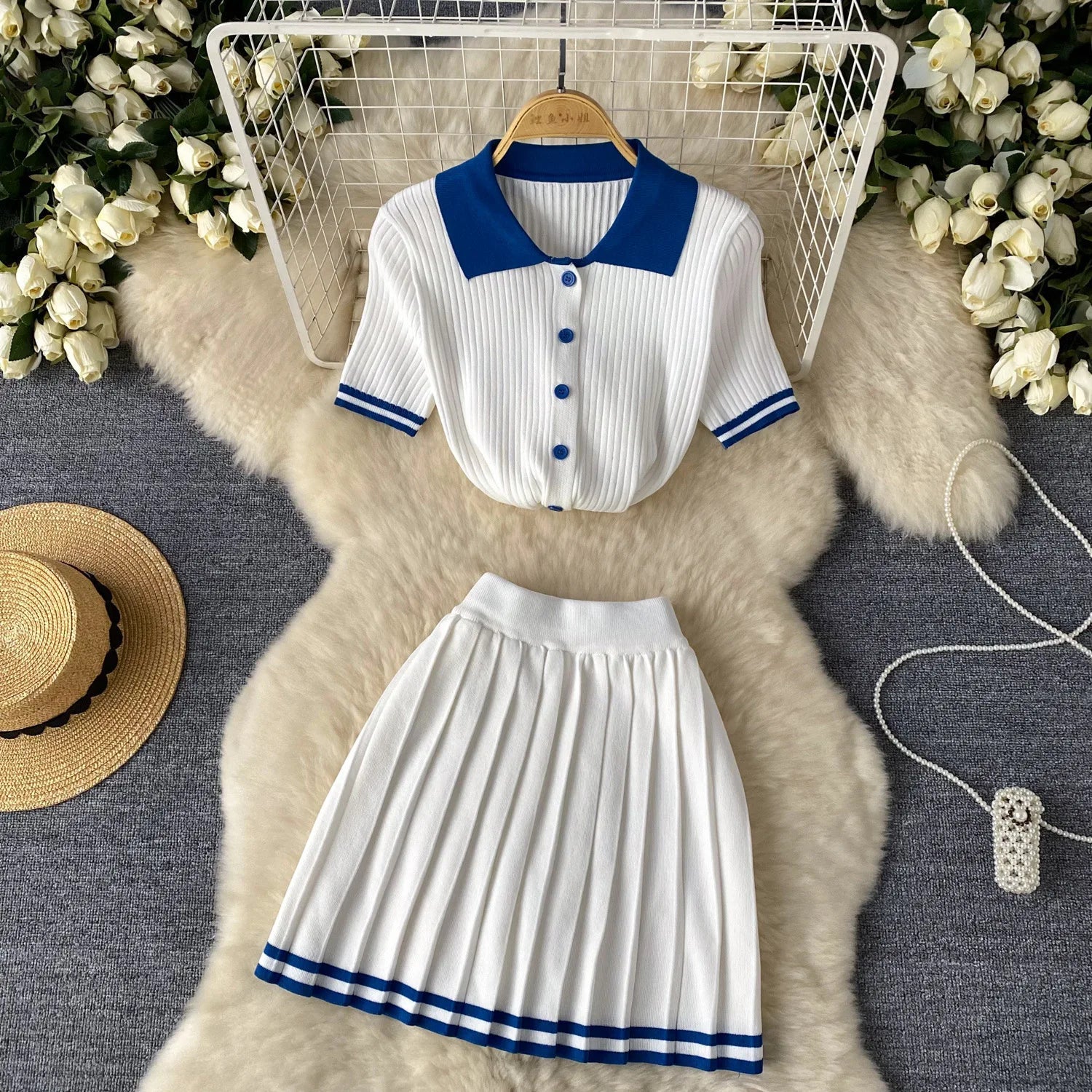 Kalenmos women's two-piece mini skirt set featuring a polo knit top and pleated skirt, stylish and casual fashion ensemble.