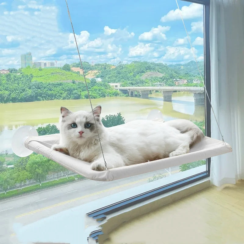 Showlu Smart General cat window hammock attached to a window frame with a cozy fabric surface for comfortable outdoor lounging.