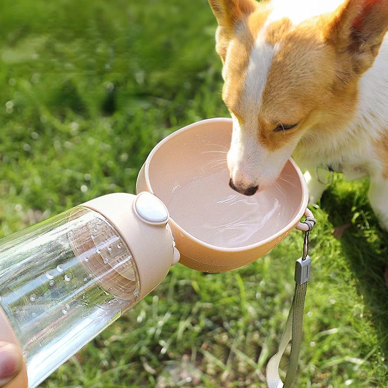 Showlu Portable Dog Water Dispenser and travel bowl with a collapsible design for pet hydration on the go.